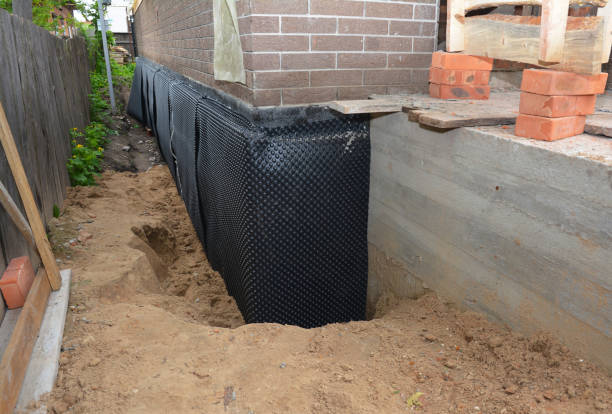 Happy homeowners after waterproofing job in Newbury